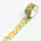 Decorative tape with floral pattern on a soft yellow background